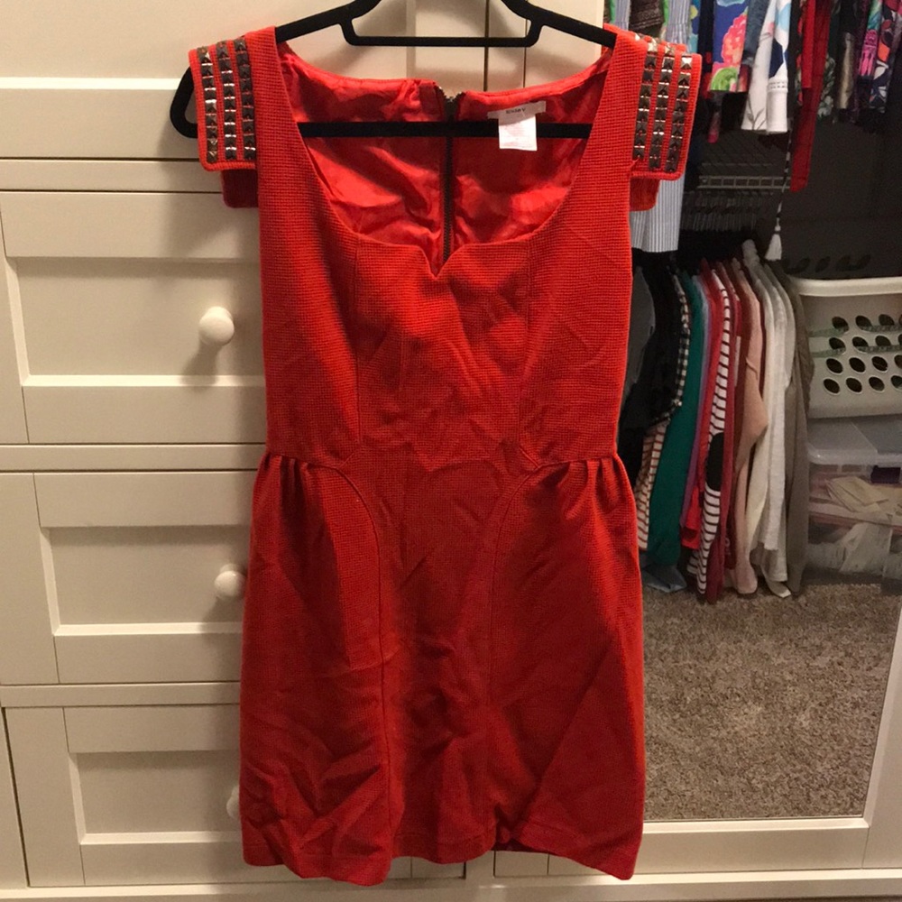 Red dress with grommets